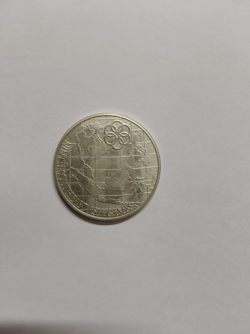 25 ringgit coin (Category: Currency) located in Singapore. Submitted by spiderman58 (Listing ID 1364094476, Image 1). Description: 25 ringgit Malaysian coin.