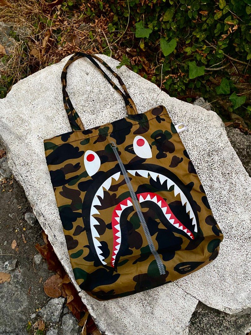 A BATHING APE BAPE SHARK TOTE BAG (Category: Luxury Bags & Wallets) located in Imus. Submitted by swizzythriftshop (Listing ID 1364154351, Image 2). Description: A BATHING APE BAPE SHARK TOTE BAG 999 MINIMAL ISSUE EXCELLENT CONDITION .