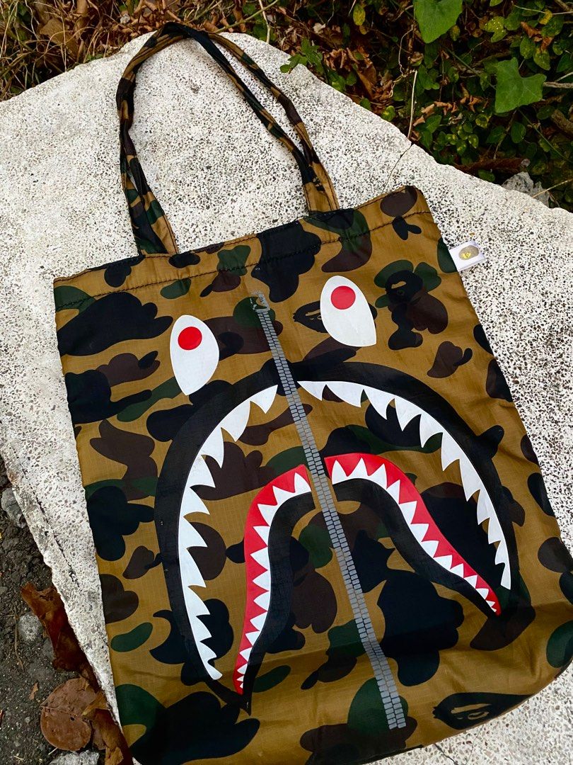 A BATHING APE BAPE SHARK TOTE BAG (Category: Luxury Bags & Wallets) located in Imus. Submitted by swizzythriftshop (Listing ID 1364154351, Image 3). Description: A BATHING APE BAPE SHARK TOTE BAG 999 MINIMAL ISSUE EXCELLENT CONDITION .