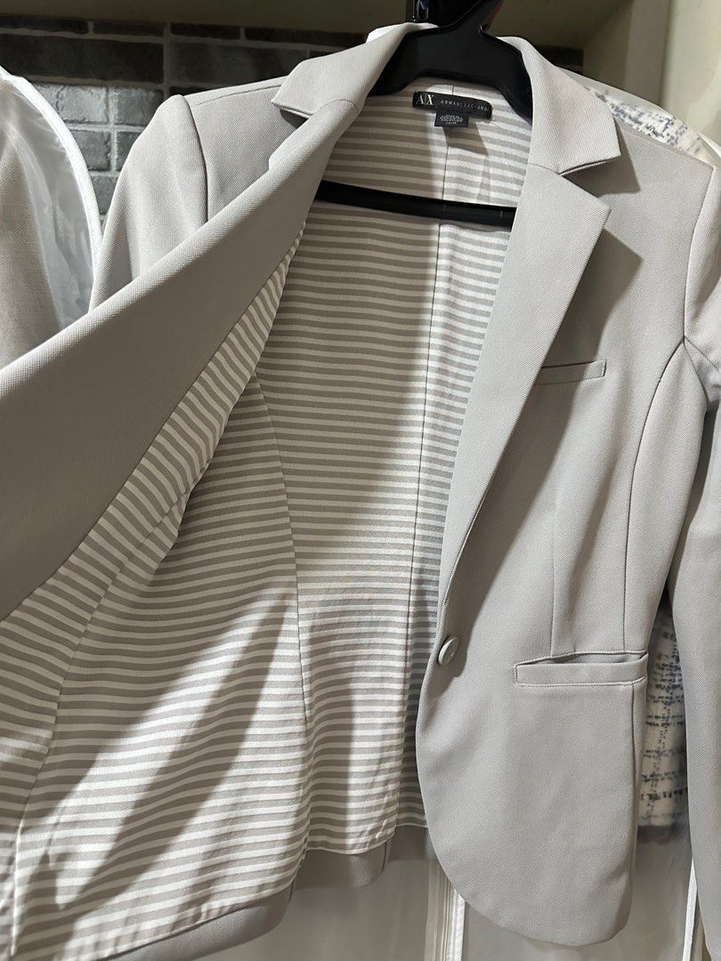 [SALE] Armani Exchange Blazer (Light Gray) (Category: Coats, Jackets and Outerwear) located in Mandaluyong City. Submitted by rybalev (Listing ID 1364149123, Image 2). Description: 14” shoulder width 16” armpit to armpit width 22” length Color: Light silver gray Color rate and condition: 9/10 Size: XS Like new condition Body and lining is 100% polyster RFS: Decluttering Plus shipping fee Loc: Mandaluyong .
