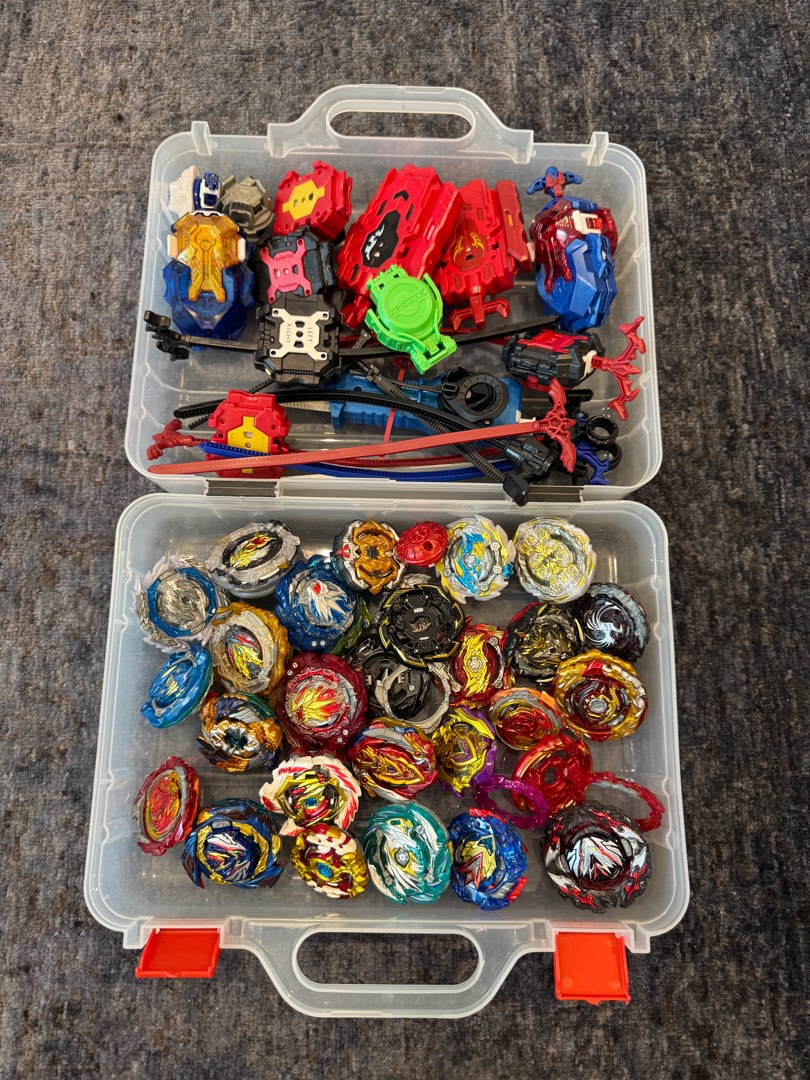 Box full of Beyblades with launchers, Hobbies & Toys, Toys & Games on ...