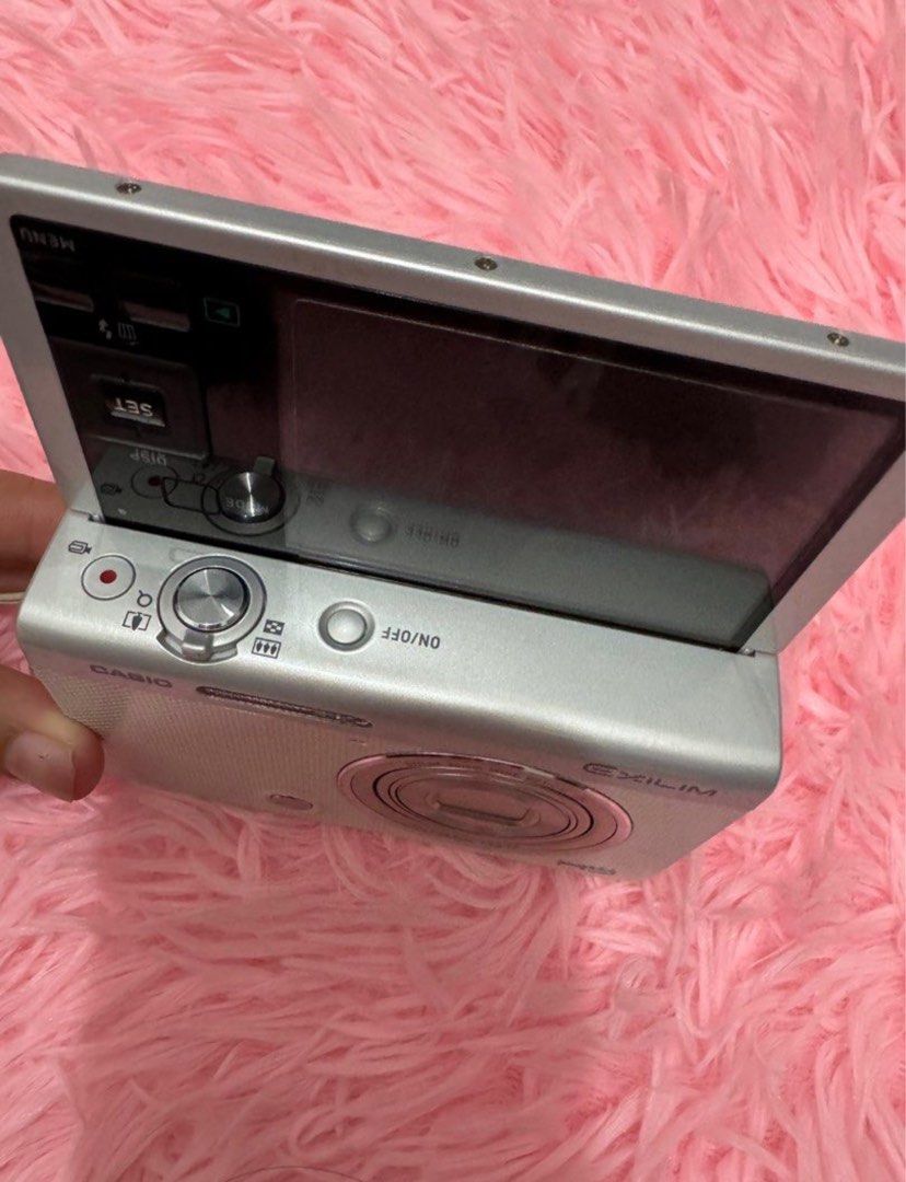 Casio Exilim EX-ZR60 (Category: Cameras) located in Angeles City. Submitted by preluvs_stuff (Listing ID 1364214378, Image 2). Description: Casio Exilim EX-ZR60 (no box) in White! :17,000 FREE SHIPPING! NO ISSUE! Inclusion: - Camera Unit - 64 gb SD Card - Universal Charger - Case - Original Battery - SD Card reader for USB C - Camera bead charm must read: - this is flippable cam! super nice and rare - 16.1 megapixels & 10x optical zoom - 1080/60p