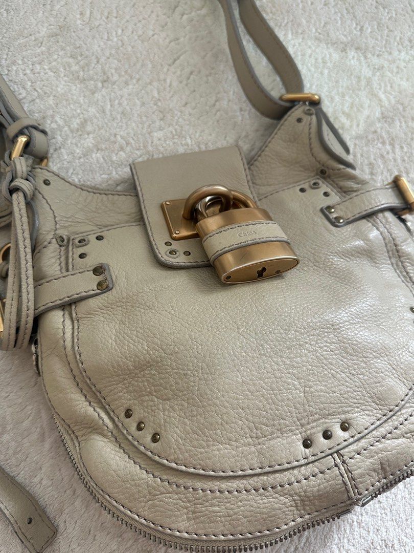 Chloe Paddington shoulder bag in Cream (Category: Bags & Wallets) located in Singapore. Submitted by coffeelover2233 (Listing ID 1364176873, Image 2). Description: Purchased Vintage from Japan 29x24x4.5cm Condition as pictured (7.5/10), comes as is .