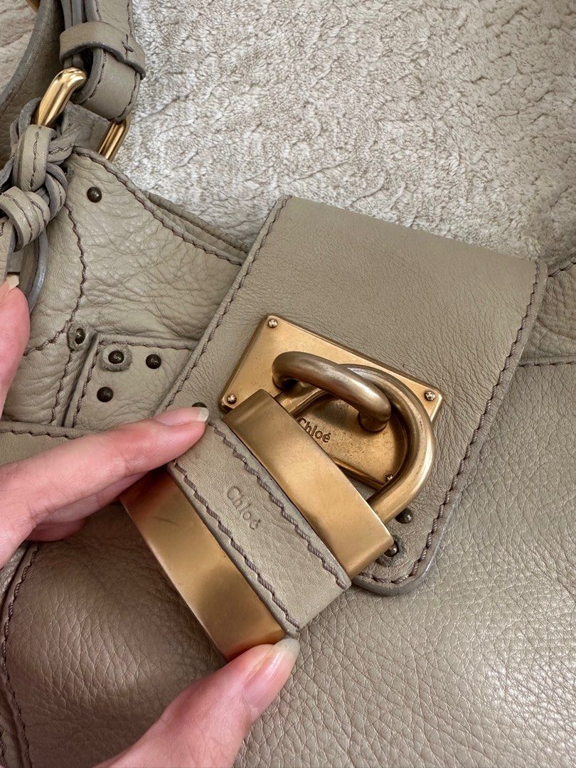 Chloe Paddington shoulder bag in Cream (Category: Bags & Wallets) located in Singapore. Submitted by coffeelover2233 (Listing ID 1364176873, Image 3). Description: Purchased Vintage from Japan 29x24x4.5cm Condition as pictured (7.5/10), comes as is .