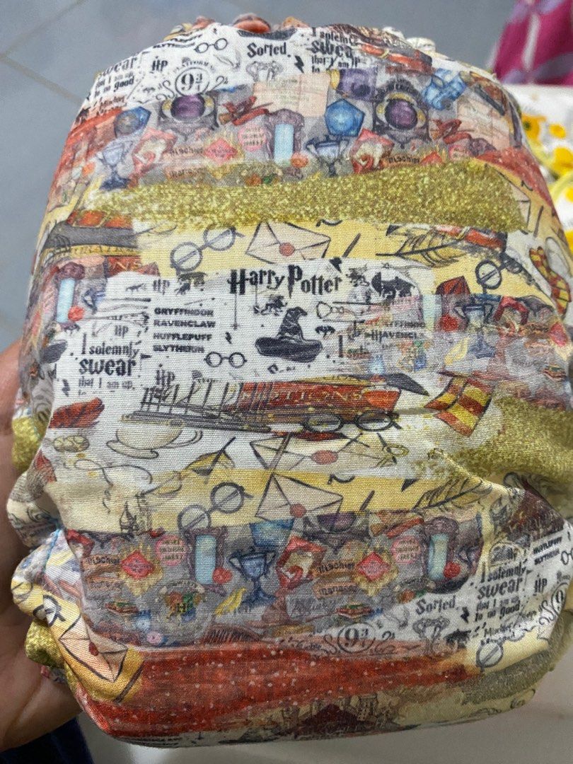 Cloth Diapers - Harry Potter (Category: Diapers & Baby Wipes) located in Zamboanga. Submitted by zamboutique (Listing ID 1364142308, Image 3). Description: Personal Preloved Cloth Diaper Rating EUC - Used less than 5x My MTO from Happy Bum By Steph Hybrid Fitteds Inner Lining - AWJ Teal/Light Green Elastics, Snaps Intact NO ISSUES No holes Original Trifold Insert - Forgot the cloth/blends. Sorry. STORED FOR LONG TIME. Need to disinfect and strip!