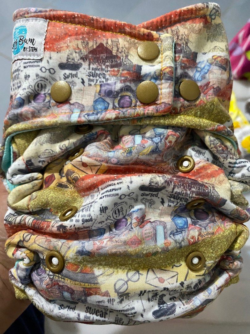Cloth Diapers - Harry Potter (Category: Diapers & Baby Wipes) located in Zamboanga. Submitted by zamboutique (Listing ID 1364142308, Image 1). Description: Personal Preloved Cloth Diaper Rating EUC - Used less than 5x My MTO from Happy Bum By Steph Hybrid Fitteds Inner Lining - AWJ Teal/Light Green Elastics, Snaps Intact NO ISSUES No holes Original Trifold Insert - Forgot the cloth/blends. Sorry. STORED FOR LONG TIME. Need to disinfect and strip!