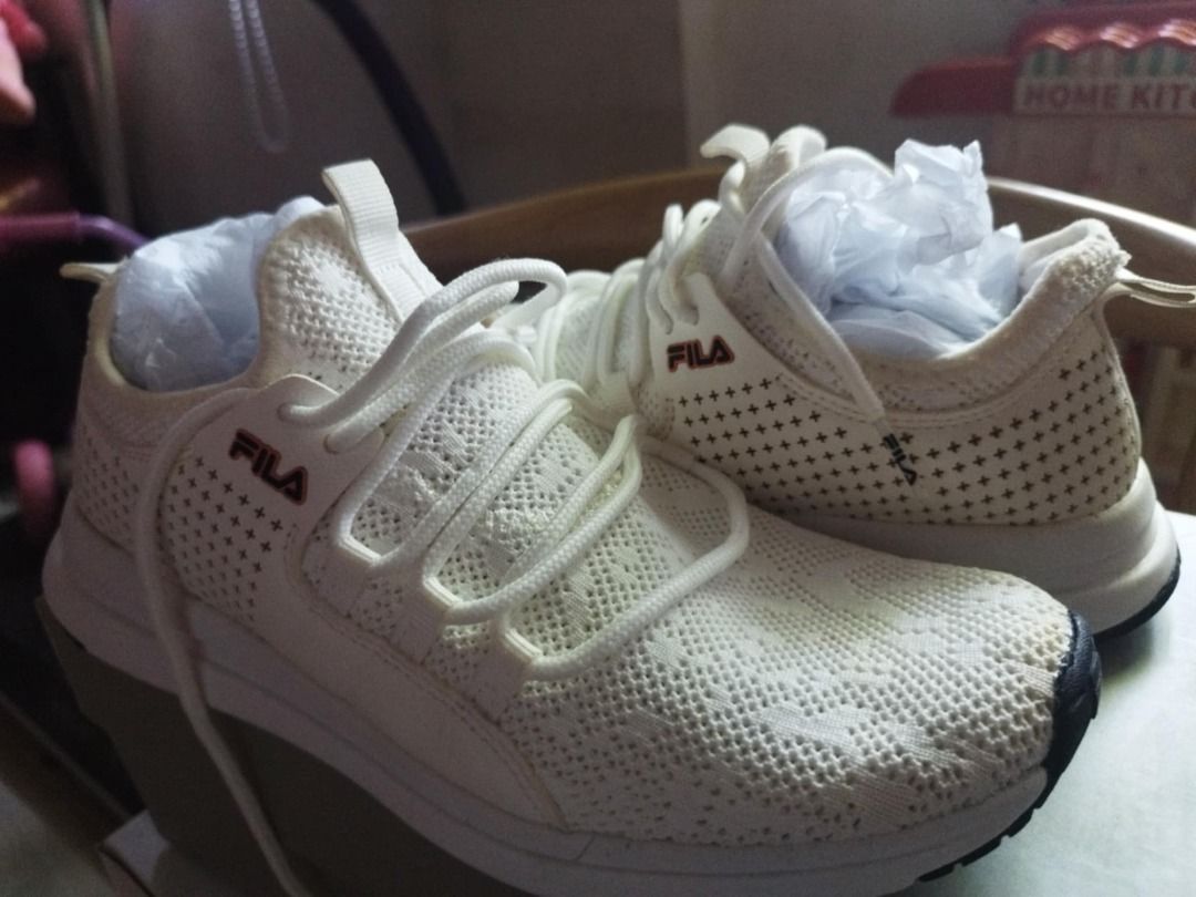 FILA running/hiking shoes (Category: Sneakers) located in Lapu Lapu. Submitted by letttee (Listing ID 1364174827, Image 1). Description: Used twice only no issues price is negotiable Message me for sure buyer deliver via maxim/ jnt express Rfs: for medical purposes .