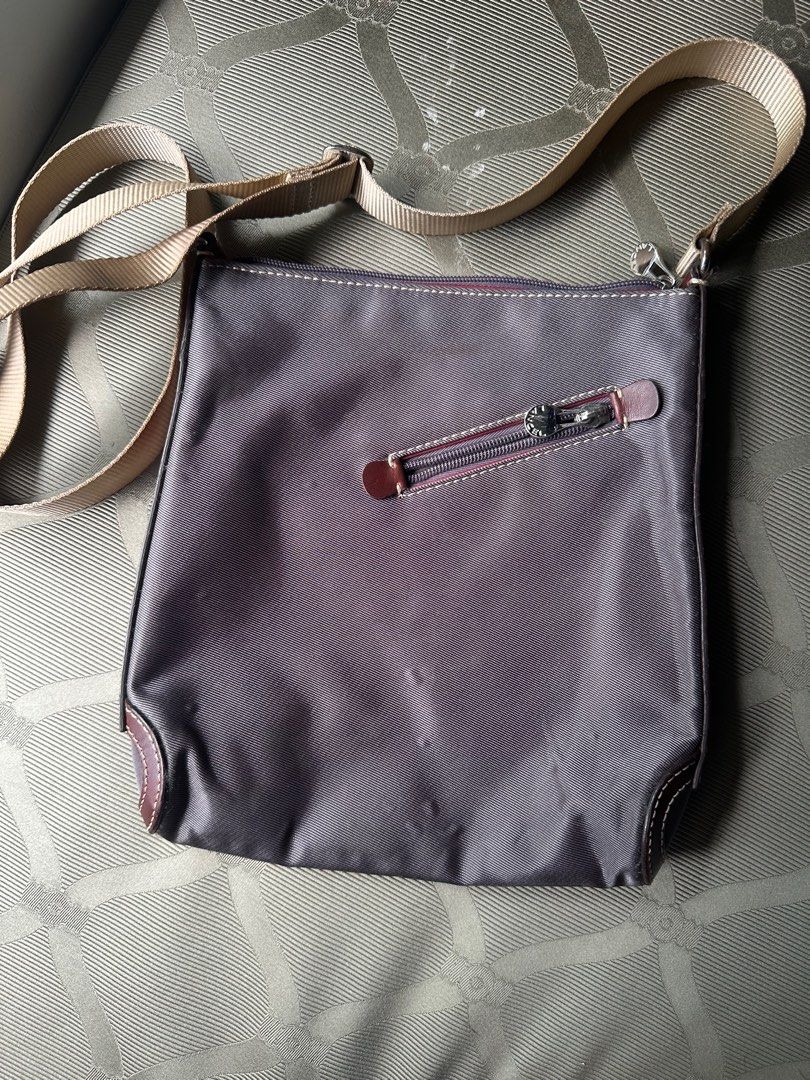 Lancel Nylon Crossbody Bag (Category: Luxury Bags & Wallets) located in Makati City. Submitted by kobeskorner (Listing ID 1364081729, Image 1). Description: Lancel Nylon Crossbody Bag Vintage handbag from the 90s by LANCEL Paris in brown nylon and leather The interior is in brown canvas with the Lancel Paris logo. There are no stains, no snags or holes 24 x 26 x 5 cm.