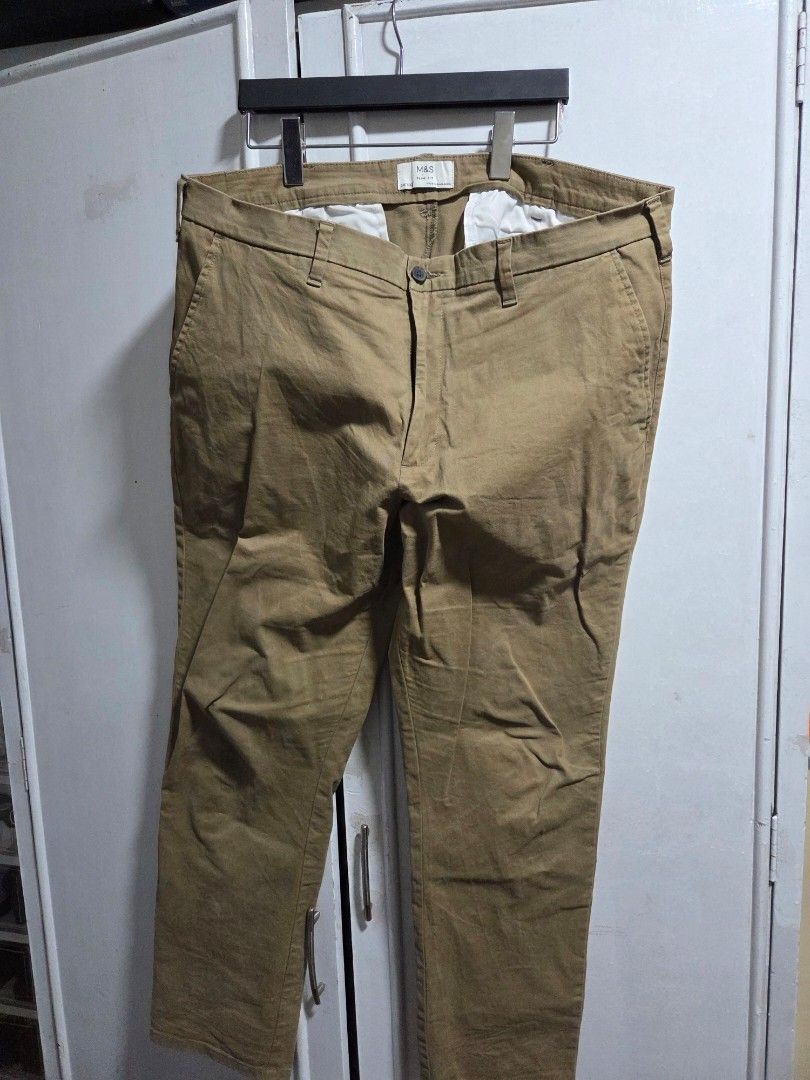 Marks and Spencer Khaki Chinos size 38 (Category: Chinos) located in Manila. Submitted by treborocin (Listing ID 1364141295, Image 1). Description: Marks and Spencer Khaki Chinos Slim Fit, size 38 Good as new, no issues M&S Marks & Spencer.