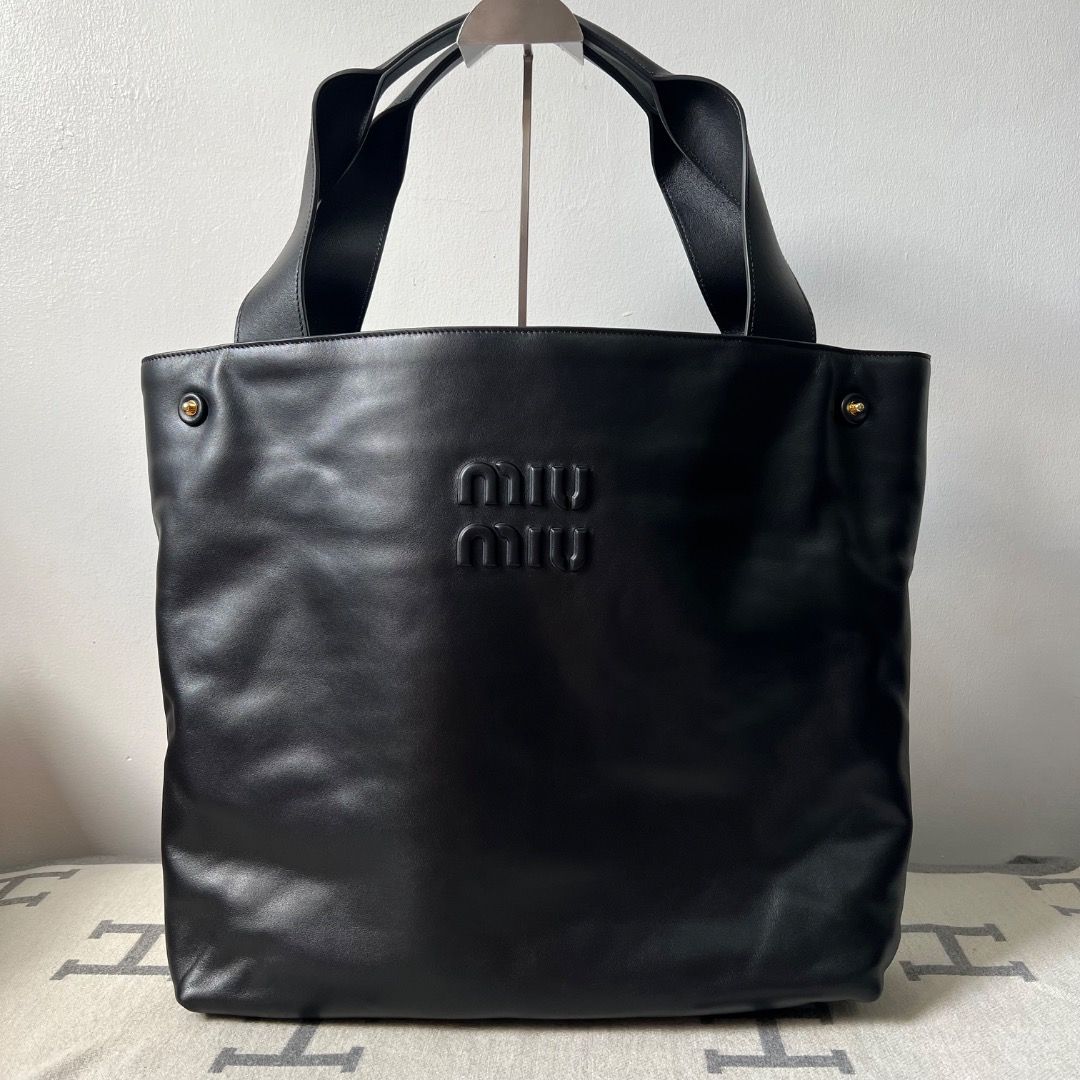 Miu Miu Logo embossed Black Hobo Bag (Category: Luxury Bags & Wallets) located in Antipolo. Submitted by chanchimj (Listing ID 1360664240, Image 3). Description: .