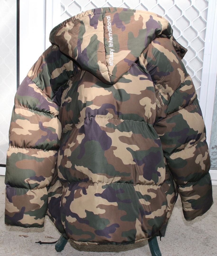 Preloved International Stussy Down Jacket Camouflage, Stussy Camo Puffer with hood (Category: Women's Clothes) located in Burnie. Submitted by tasmanianbeauties (Listing ID 1364225784, Image 2). Description: Preloved International Stussy Down Jacket Camouflage, Stussy Camo Puffer with hood Preloved International Stussy Down Jacket Camouflage, Stussy Camo Puffer with hood CA28629 Size 12 Women This jacket is polyester. It is made in China. It has 