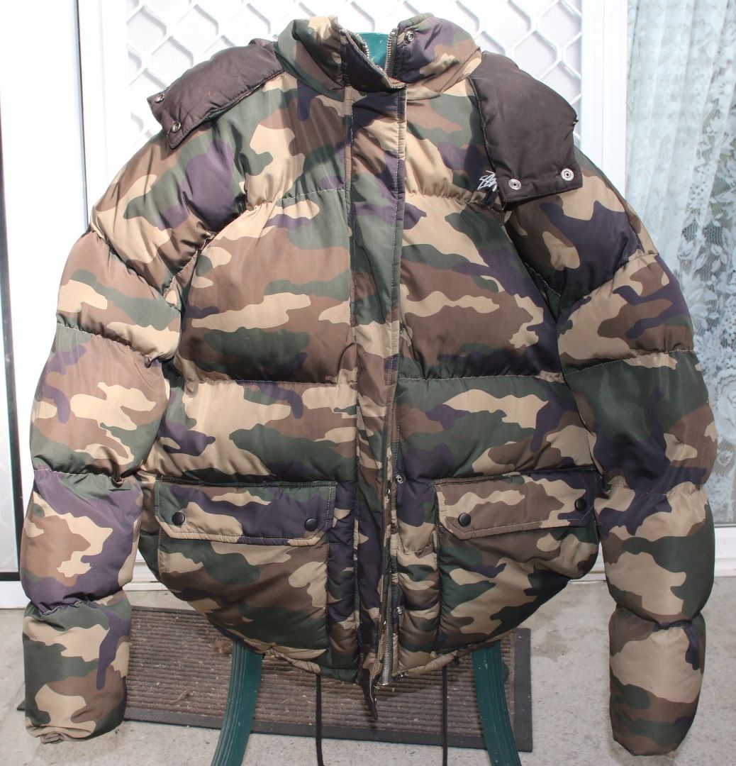 Preloved International Stussy Down Jacket Camouflage, Stussy Camo Puffer with hood (Category: Women's Clothes) located in Burnie. Submitted by tasmanianbeauties (Listing ID 1364225784, Image 1). Description: Preloved International Stussy Down Jacket Camouflage, Stussy Camo Puffer with hood Preloved International Stussy Down Jacket Camouflage, Stussy Camo Puffer with hood CA28629 Size 12 Women This jacket is polyester. It is made in China. It has 
