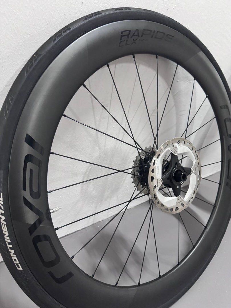 Roval Rapide CLX II Wheelset (Category: Parts & Accessories) located in Singapore. Submitted by buysellfastee (Listing ID 1364166327, Image 2). Description: Condition: 9/10 (small scuffs) Colour: Black Freehub: Shimano Selling as a set: front and back wheelset, 160mm rotors & 11-30 cassette Will provide receipt. No box. Rim: Rapide CLX Cabon Clincher, 700c, Disc Brake, Tubeless Rim Details: F- 51mm Depth, 35mm External Width, 21mm Internal Width: