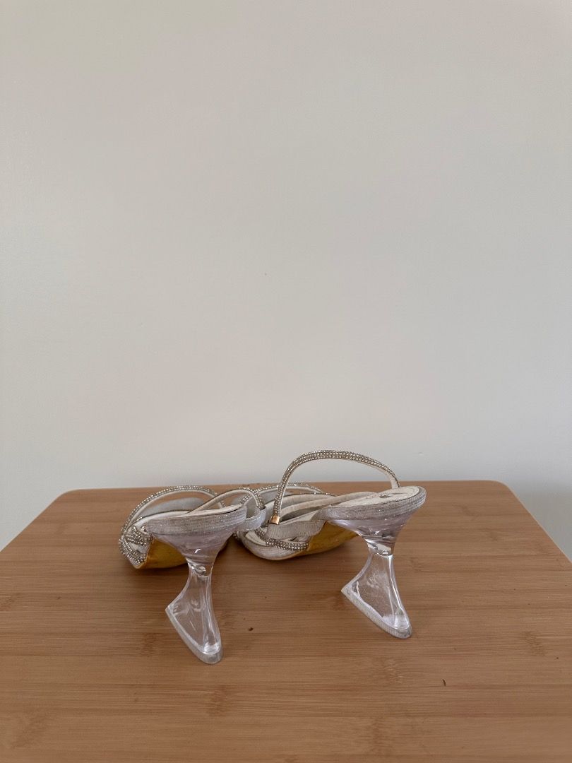 Silver open toe with strap on heels Size 38 (Category: Heels) located in Binan City. Submitted by themkeps (Listing ID 1364083485, Image 2). Description: Used for ball worn once tried to wash but the black marking is not coming off unknown brand comes with box .
