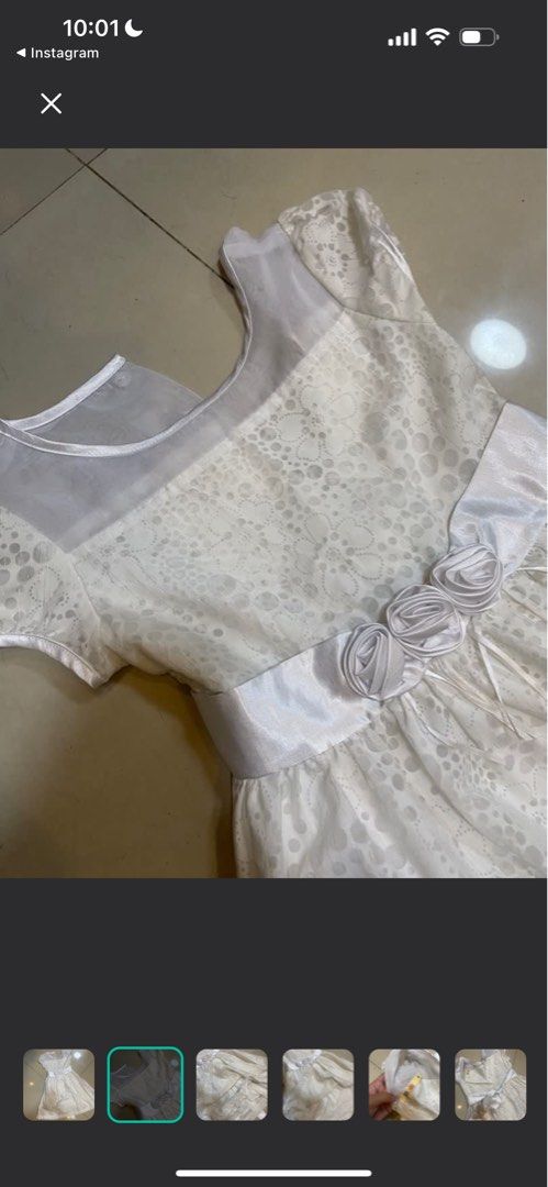 White Dress/Gown (Category: Babies & Kids Fashion) located in Pasig City. Submitted by declutterisreal (Listing ID 1364188242, Image 2). Description: Can be use for first communion! Size 8 Used once Makapal / double layered Maganda Tela .