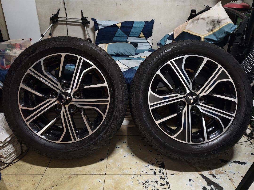 Xpander Original Stock Mags with vinyl sticker (Category: Mags and Tires) located in Quezon City. Submitted by mauen (Listing ID 1364111863, Image 3). Description: Xpander Original Stock Mags with vinyl sticker for added design. Slight gutter marks... No other issue Negotiable..