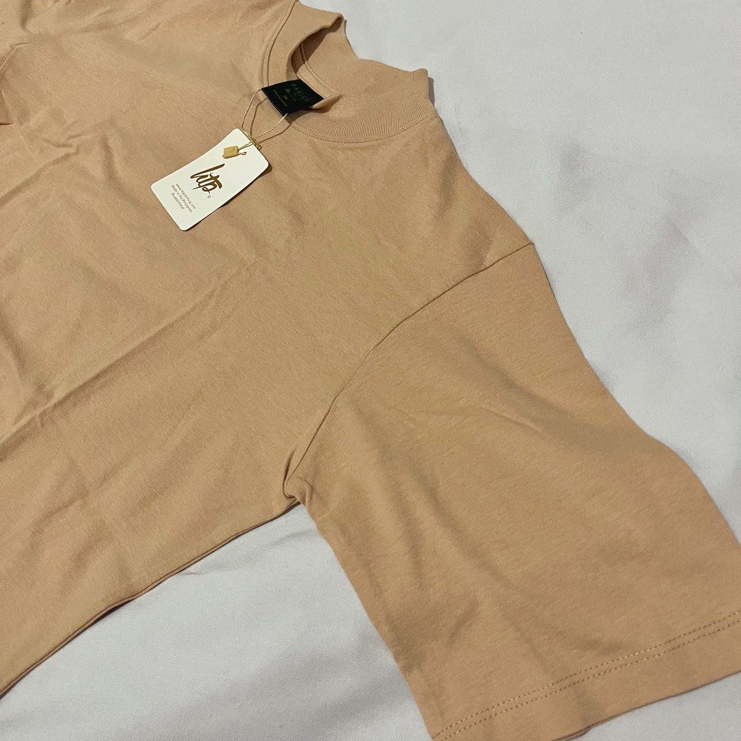 basic premium tee 3/4 sleeve office top in apricot [htp basics] (Category: Others Tops) located in Muntinlupa City. Submitted by mikhasellsstuff (Listing ID 1364301744, Image 2). Description: Brand new. Selling for a lower price (SRP is 320) Available sizes: SM and XL.