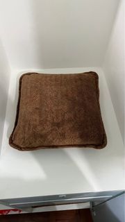Brown massage throw pillow