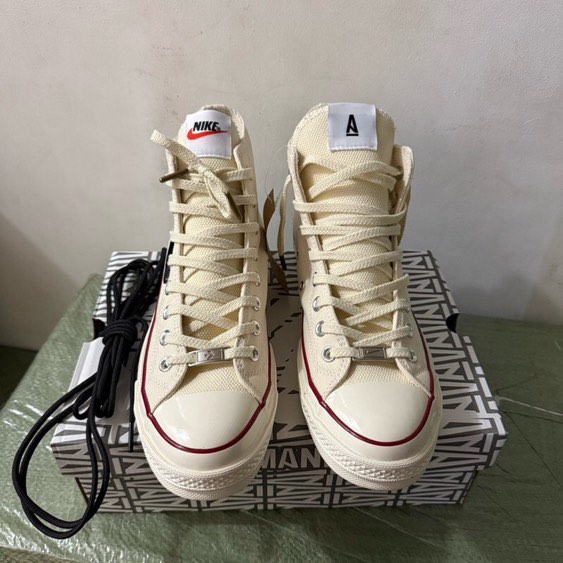 swoosh chuck taylor