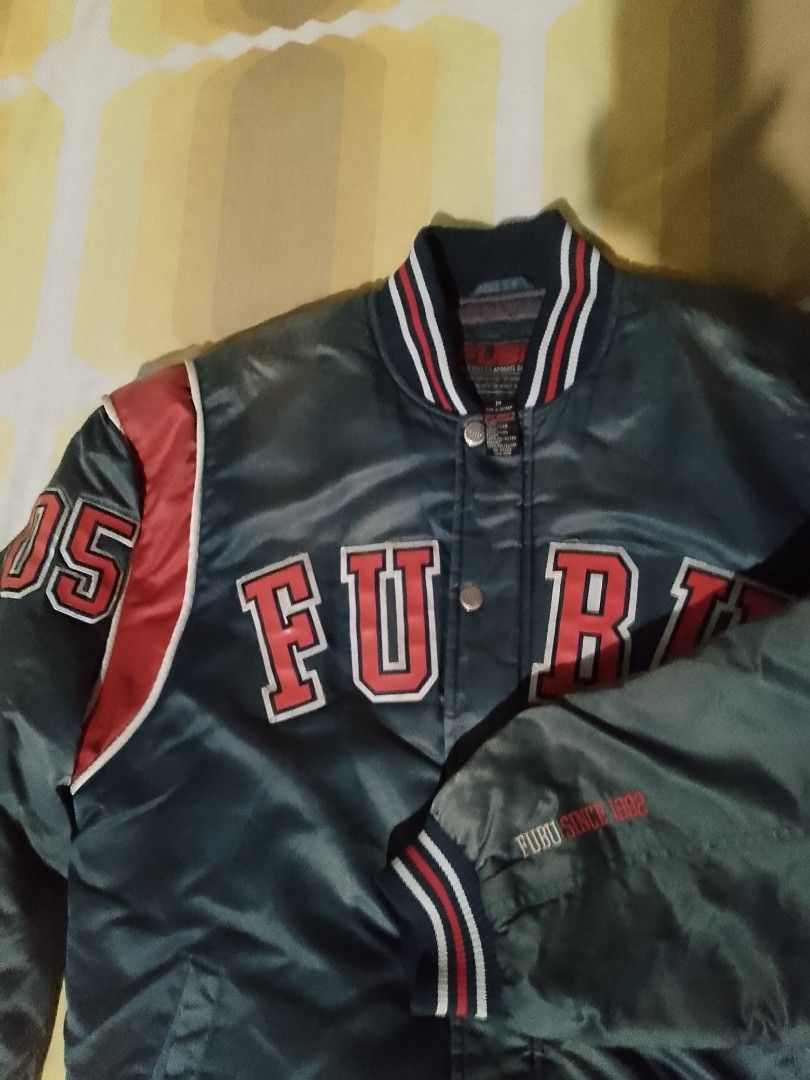 Fubu Vintage varsity jacket (Category: Activewear) located in Bauang. Submitted by mondthrift (Listing ID 1364320777, Image 2). Description: Fubu varsity jacket size medium 22/28 8.5/10 colorate.