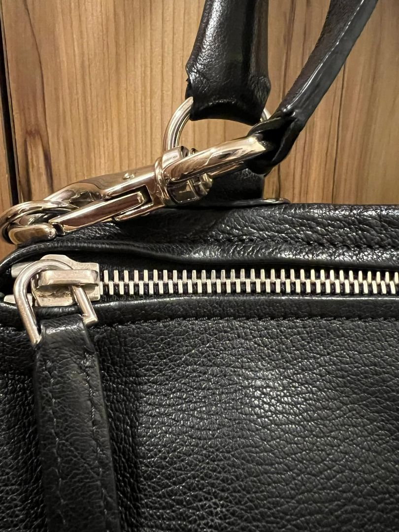 Givenchy Pandora (Category: Luxury Bags & Wallets) located in Makati City. Submitted by andre_esque (Listing ID 1364284726, Image 3). Description: Authentic Givenchy Pandora (Medium) Calfskin leather Excellent condition. Comes with dustbag and care cards..