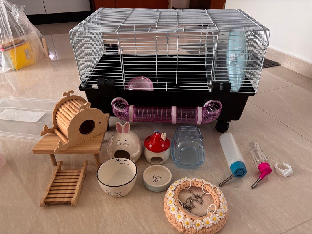Hamster cage and accessories (Category: Homes & Other Pet Accessories) located in Singapore. Submitted by arcaieeee (Listing ID 1364265551, Image 1). Description: FIRST PICTURE: 60cm Hamster Cage - $40 Each item for $3 SECOND PICTURE: All for $15 -Bathing sand $2 -Urine sand $2 -Urine sand $2 -Hamster food (New) $5 -Paper pulb $2 -Hamster bedding $3.