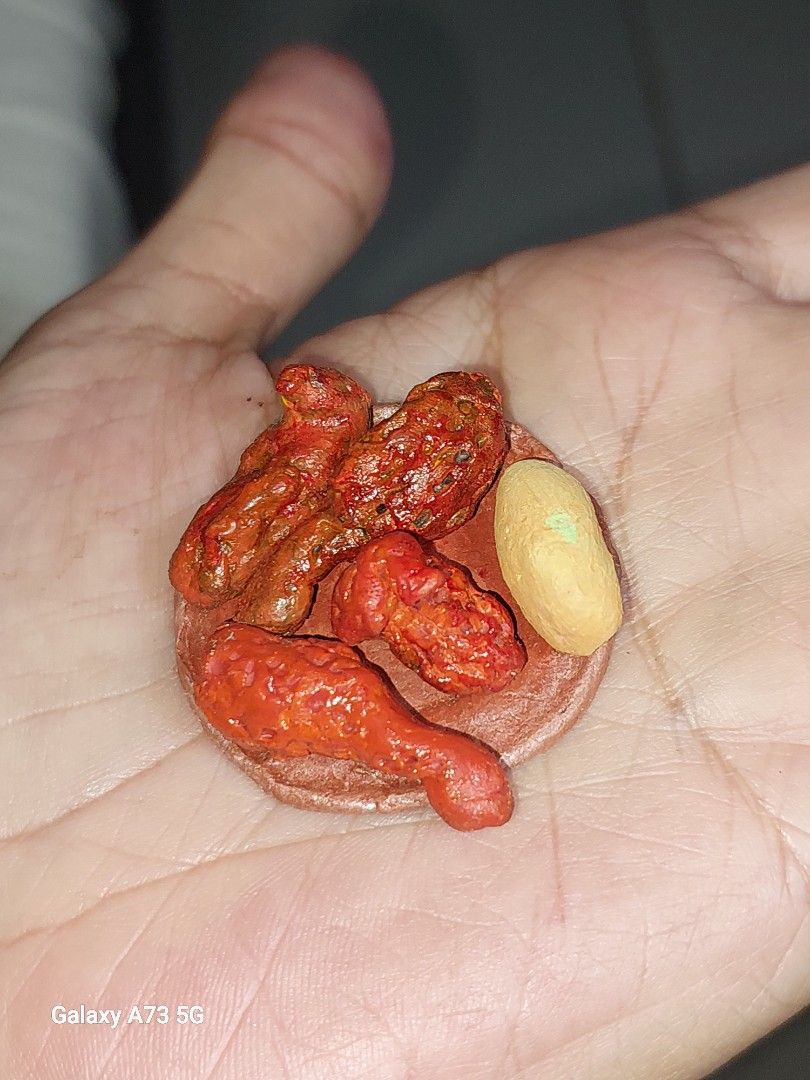 Miniature fried chix (Category: Designer & Blind Box Toys) located in Quezon City. Submitted by kristal68 (Listing ID 1364266878, Image 2). Description: 5 pcs for 15pesos only made of clay with plate..