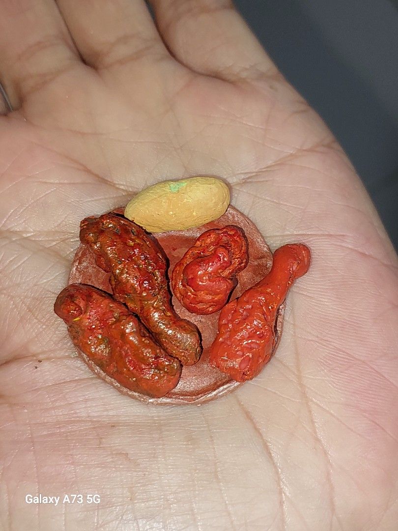 Miniature fried chix (Category: Designer & Blind Box Toys) located in Quezon City. Submitted by kristal68 (Listing ID 1364266878, Image 1). Description: 5 pcs for 15pesos only made of clay with plate..