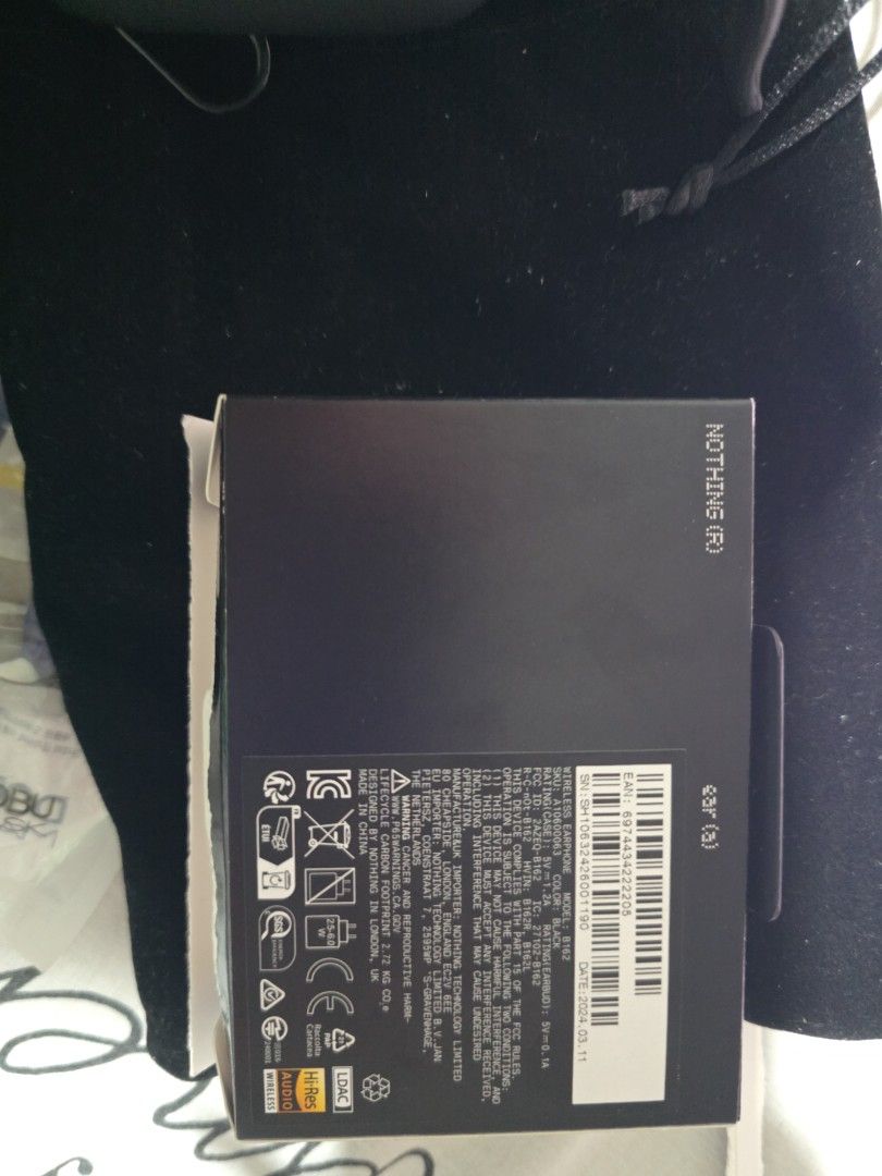 Nothing ear a earbuds (Category: Earphones) located in Singapore. Submitted by gx2318 (Listing ID 1364359715, Image 3). Description: new with pouches and case box.. selling due to lack of bass...