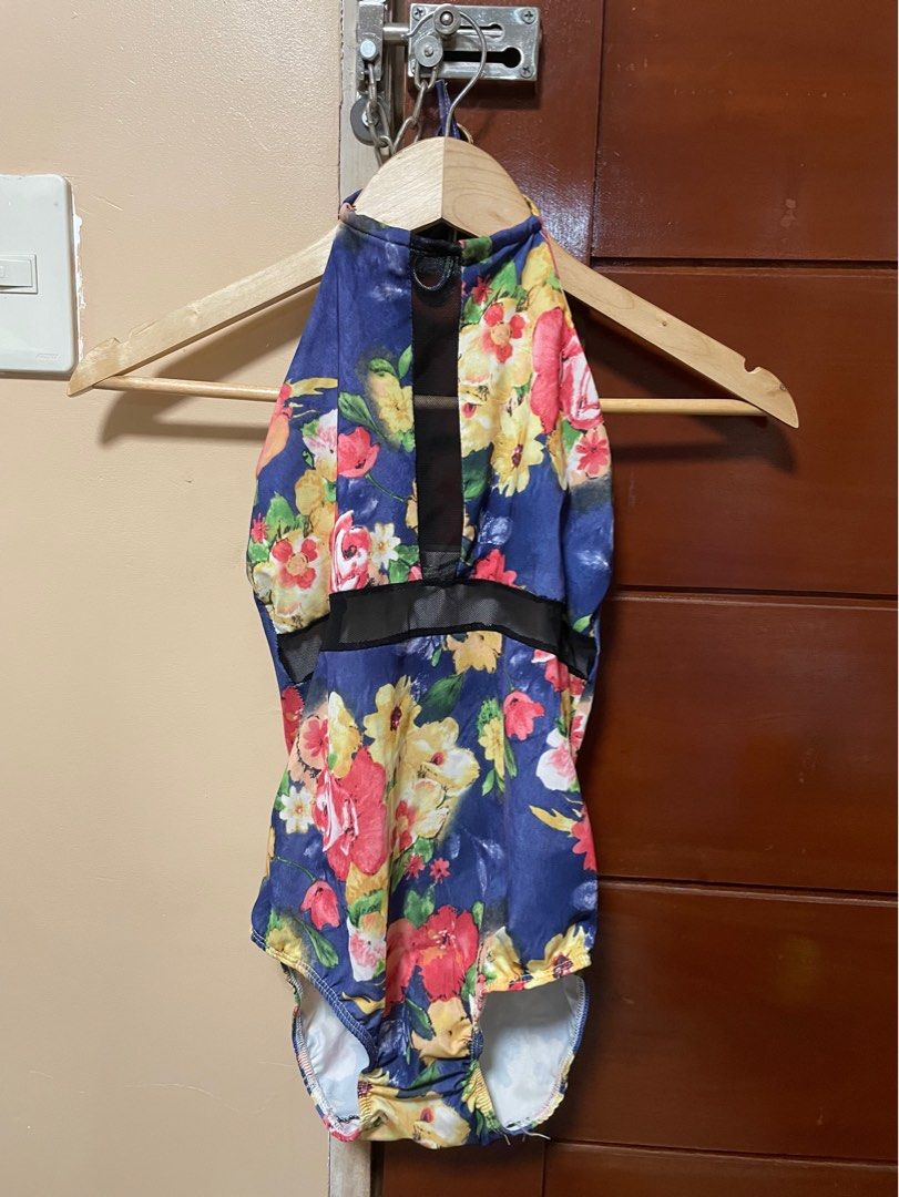 One piece floral swimsuit (Category: Bikinis & Swimsuits) located in Rizal. Submitted by miunicabella (Listing ID 1364361528, Image 1). Description: Free when you avail posted items. No pads but with pad slot :) very flattering! Fits Small to Semi Medium.