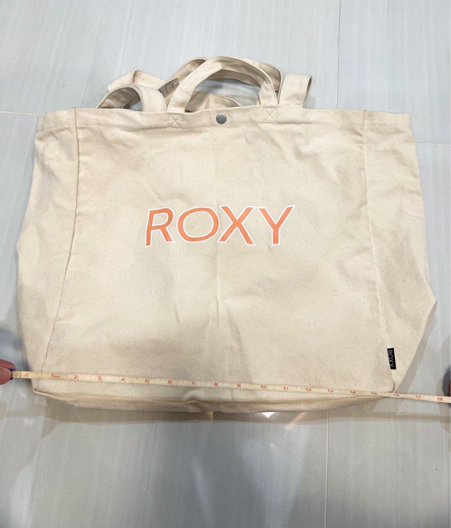 Original Roxy Tote Bag in Beige still with Tag (Category: Tote Bags) located in Manila. Submitted by jennystuff (Listing ID 1364359664, Image 3). Description: -101% Authentic Roxy Tote bag in Beige -Still with Tag - 6,050 yen or around 2,400 in Ph Peso Perfect for summer beach tote Can carry a lot of things.