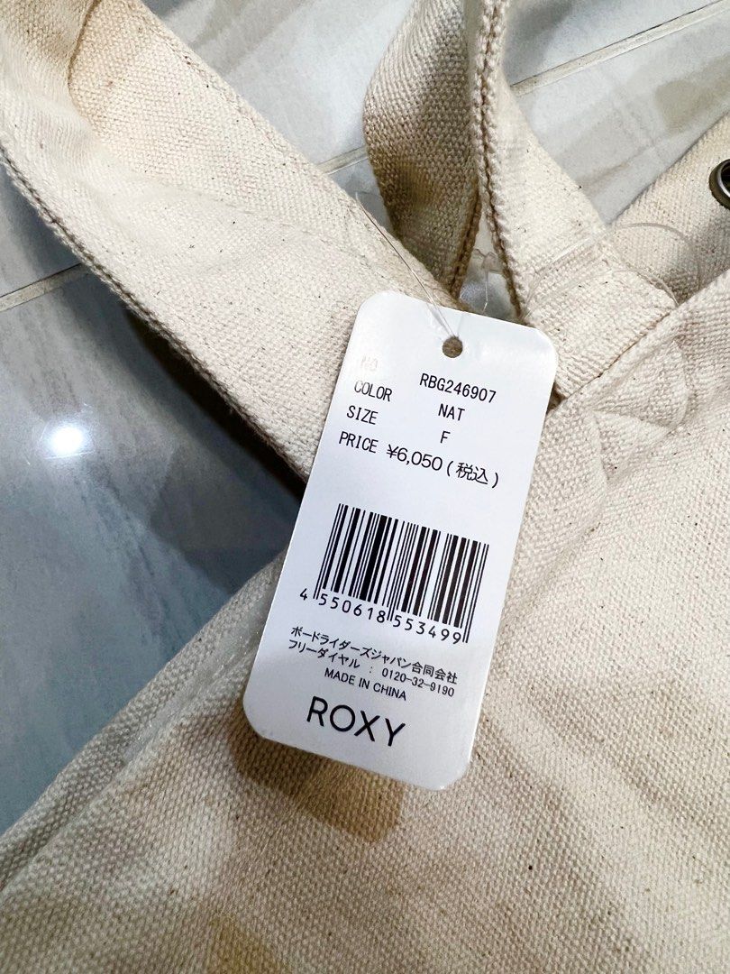 Original Roxy Tote Bag in Beige still with Tag (Category: Tote Bags) located in Manila. Submitted by jennystuff (Listing ID 1364359664, Image 2). Description: -101% Authentic Roxy Tote bag in Beige -Still with Tag - 6,050 yen or around 2,400 in Ph Peso Perfect for summer beach tote Can carry a lot of things.