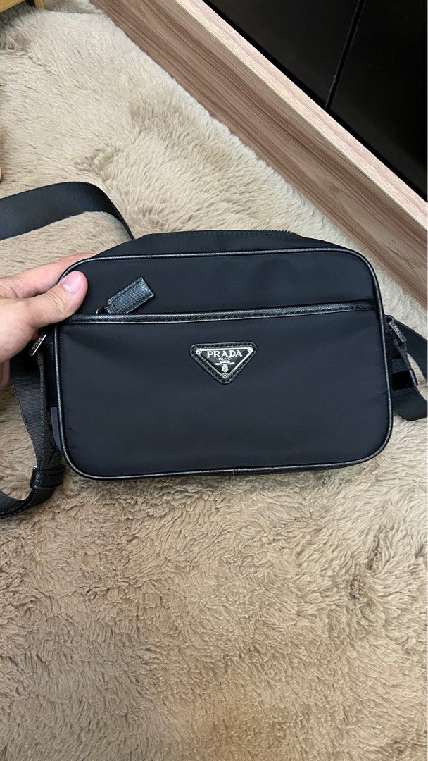 Prada Camera Messenger Bag (Category: Luxury Bags & Wallets) located in Mandaluyong City. Submitted by ilovenicethings888 (Listing ID 1364371739, Image 1). Description: Rfs : decluttering.