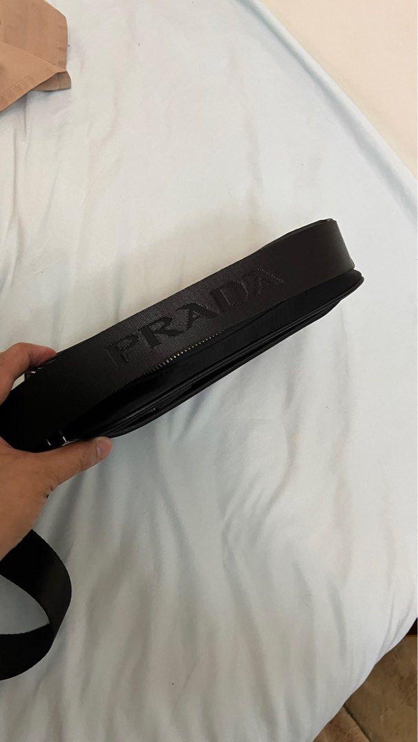 Prada Camera Messenger Bag (Category: Luxury Bags & Wallets) located in Mandaluyong City. Submitted by ilovenicethings888 (Listing ID 1364371739, Image 3). Description: Rfs : decluttering.