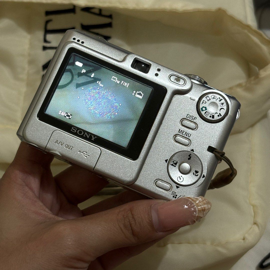 Sony DSC W35 Digital Camera (Category: Cameras) located in General Trias. Submitted by stashby.ya (Listing ID 1364274224, Image 3). Description: SONY DSC W35 ⋆𐙚₊˚⊹♡ ☁️ please do your own research about the camera specs : - 7.2 mp - 3x optical zoom - WORKING zoom in and out and other buttons! - has internal storage around 20pics HONEST ISSUE: - lcd burn (replaceable :)) - needs lens cleaning, has lens dust, hazy dreamy output - signs of usage inc