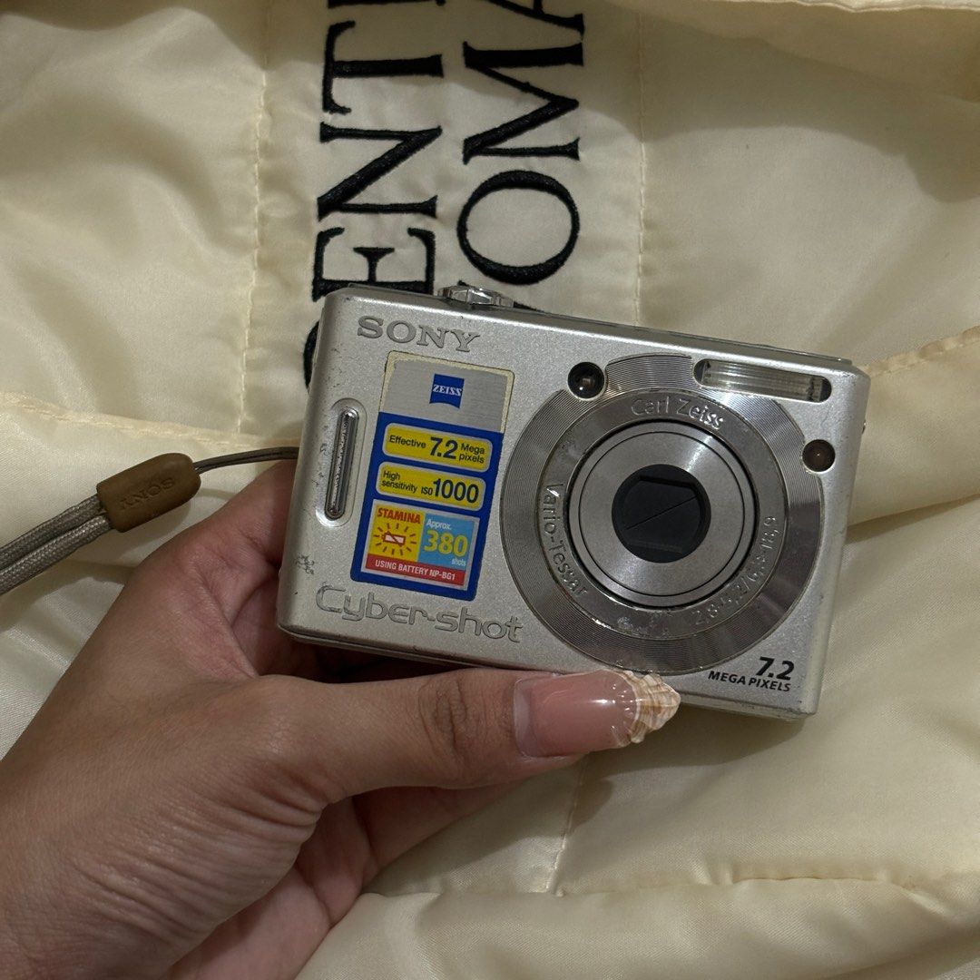 Sony DSC W35 Digital Camera (Category: Cameras) located in General Trias. Submitted by stashby.ya (Listing ID 1364274224, Image 1). Description: SONY DSC W35 ⋆𐙚₊˚⊹♡ ☁️ please do your own research about the camera specs : - 7.2 mp - 3x optical zoom - WORKING zoom in and out and other buttons! - has internal storage around 20pics HONEST ISSUE: - lcd burn (replaceable :)) - needs lens cleaning, has lens dust, hazy dreamy output - signs of usage inc