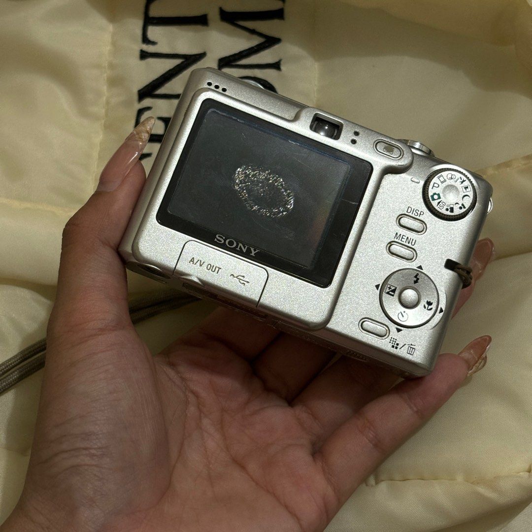 Sony DSC W35 Digital Camera (Category: Cameras) located in General Trias. Submitted by stashby.ya (Listing ID 1364274224, Image 2). Description: SONY DSC W35 ⋆𐙚₊˚⊹♡ ☁️ please do your own research about the camera specs : - 7.2 mp - 3x optical zoom - WORKING zoom in and out and other buttons! - has internal storage around 20pics HONEST ISSUE: - lcd burn (replaceable :)) - needs lens cleaning, has lens dust, hazy dreamy output - signs of usage inc