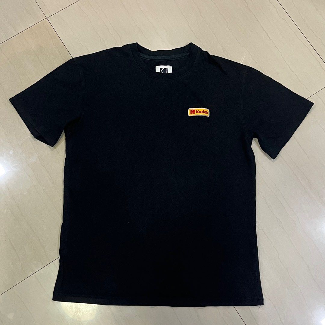 (Thrifted) Kodak Shirt - Black (Category: Tshirts & Polo Shirts ) located in Ozamiz City. Submitted by thriftrevival (Listing ID 1364333797, Image 1). Description: Size (Inches & CM) • Chest: 21in or 53cm • Shoulder: 19in or 50cm • Length: 27in or 69cm.