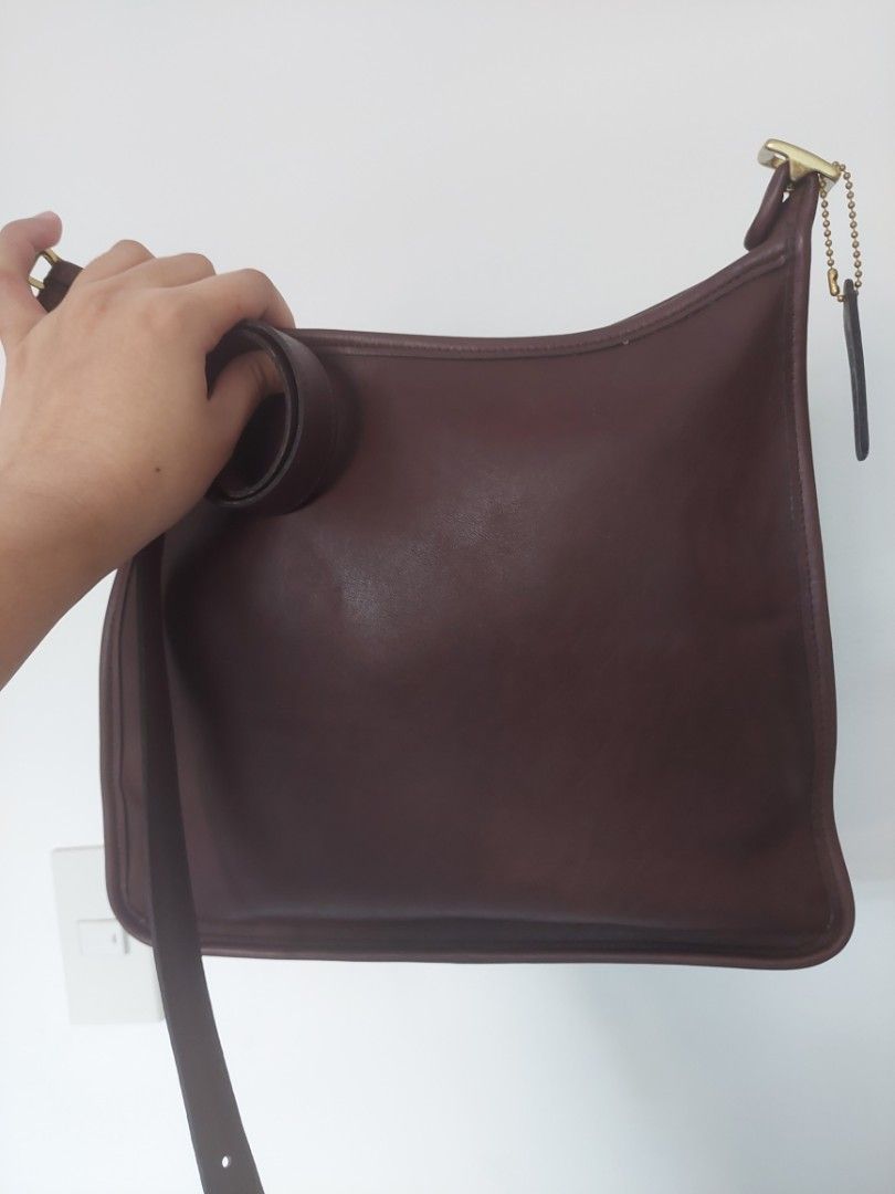 Vintage coach 9073 in mahogany (Category: Purses & Pouches) located in Manila. Submitted by selenium30747 (Listing ID 1364279749, Image 1). Description: vintage coach 9073 with original hangtag and strap color: dark brown/ mahogany shipping will be shouldered by buyer.