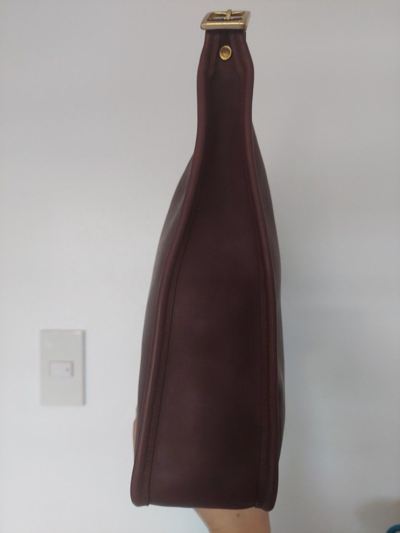 Vintage coach 9073 in mahogany (Category: Purses & Pouches) located in Manila. Submitted by selenium30747 (Listing ID 1364279749, Image 3). Description: vintage coach 9073 with original hangtag and strap color: dark brown/ mahogany shipping will be shouldered by buyer.