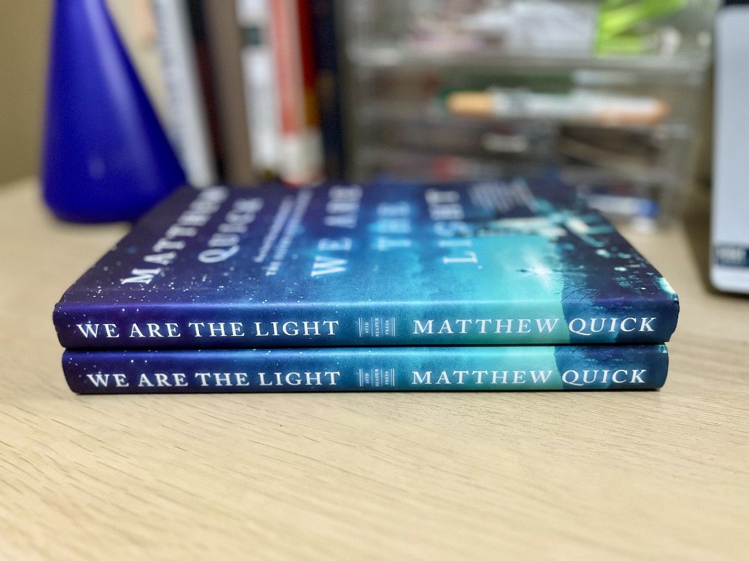 We Are the Light by Matthew Quick [BRANDNEW & HARDBOUND] (Category: Storybooks) located in Quezon City. Submitted by winterhess (Listing ID 1364248726, Image 3). Description: LIFE IS FULL OF GUARDIAN ANGELS. Lucas Goodgame lives in Majestic, Pennsylvania, a quaint suburb that has been torn apart by a recent tragedy. Everyone in Majestic sees Lucas as a hero—everyone, that is, except Lucas himself. Insisting that his deceased wife, Darcy, visits h