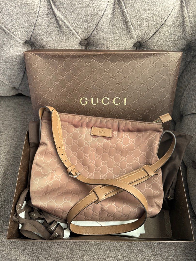 Authentic Gucci Sling Bag (Category: Luxury Bags & Wallets) located in Manila. Submitted by sweetlips01 (Listing ID 1364490349, Image 1). Description: Bought from Japan Auction Complete with Box, Ribbon, Dust Bag, care cards and swatch Very Clean interior and no smell Barely used and just stored in the cabinet, Flaw: leaking at the zipper section (you can bring this for bag spa) see photos 1 and 6 Slightly negotiable .