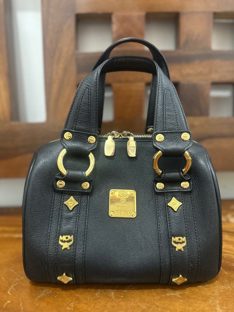 MCM Mini Boston Bag (Category: Luxury Bags & Wallets) located in Makati City. Submitted by petite_preloved2 (Listing ID 1364406796, Image 1). Description: In pristine condition 100% Money Back Authentic Can meet up at the Uptown Mall in BGC Price is slightly negotiable Comes with freebies .