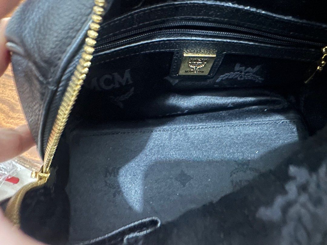 MCM Mini Boston Bag (Category: Luxury Bags & Wallets) located in Makati City. Submitted by petite_preloved2 (Listing ID 1364406796, Image 3). Description: In pristine condition 100% Money Back Authentic Can meet up at the Uptown Mall in BGC Price is slightly negotiable Comes with freebies .
