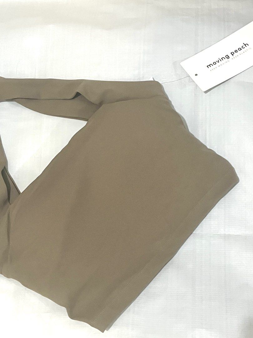 Moving Peach Sports Bra (Category: Activewear) located in Manila. Submitted by bnca214 (Listing ID 1364496177, Image 3). Description: Moving Peach Sports Bra New with tag and packaging Color: Deep Khaki Size: Small RFS: Too small for me Shipment through grab/lalamove Metro Manila Area only to be shouldered by buyer .