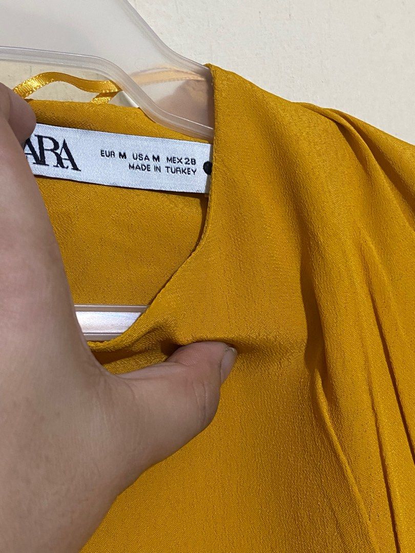 Mustard Blouse Longsleeves (Category: Blouses) located in Pasay City. Submitted by _jkching (Listing ID 1364506059, Image 2). Description: Zara long sleeve Medium size in tag can fit to Small RFS: decluterring.