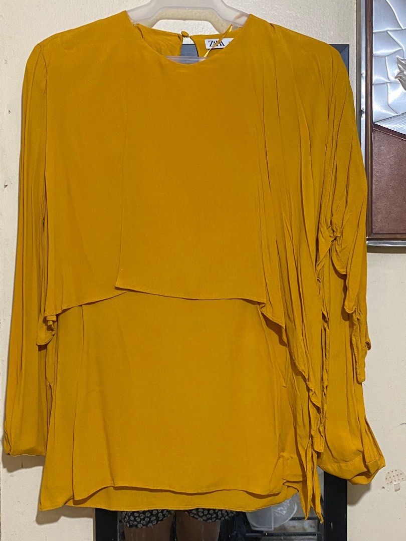 Mustard Blouse Longsleeves (Category: Blouses) located in Pasay City. Submitted by _jkching (Listing ID 1364506059, Image 1). Description: Zara long sleeve Medium size in tag can fit to Small RFS: decluterring.