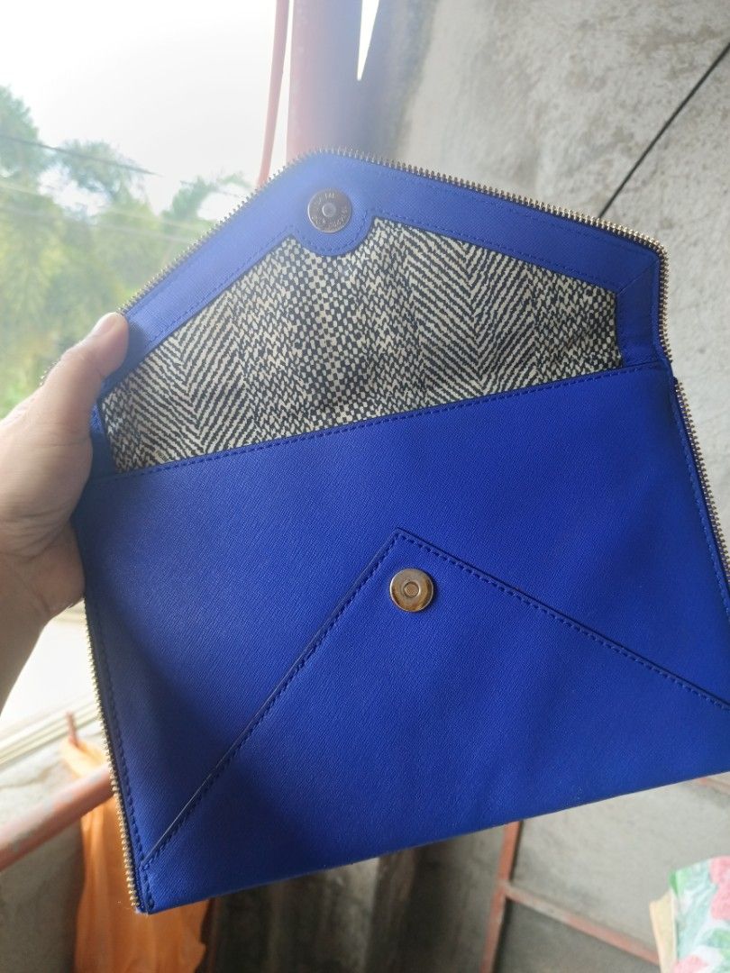 Rebecca Minkoff Clutch (Category: Clutches) located in Dipolog. Submitted by snegrej10 (Listing ID 1364431785, Image 3). Description: like new no issue nice color 11 x 7.5 inches + 110 sf.