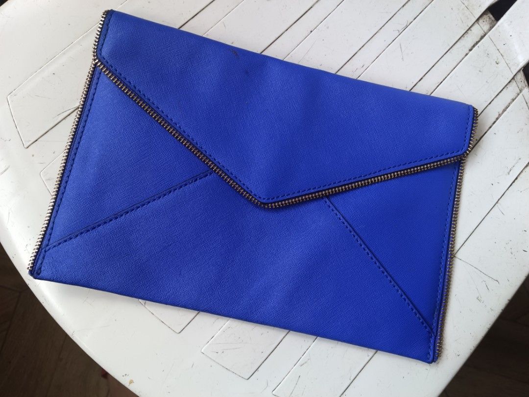 Rebecca Minkoff Clutch (Category: Clutches) located in Dipolog. Submitted by snegrej10 (Listing ID 1364431785, Image 1). Description: like new no issue nice color 11 x 7.5 inches + 110 sf.