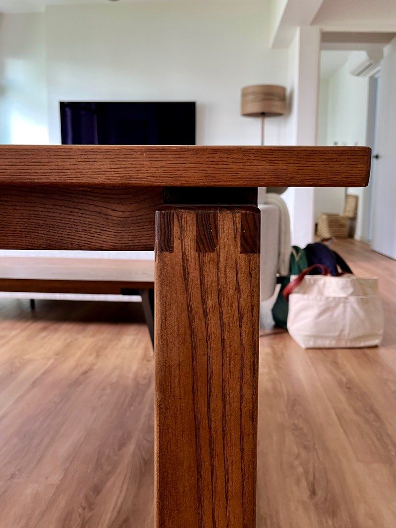 Solid Wood Dining Table (Category: Tables & Sets) located in Singapore. Submitted by dusktoshawn (Listing ID 1364454189, Image 2). Description: Selling my solid wood dining table. The entire table is made of Ash Wood. Tiny scuff that’s not very noticeable shown in the last photo. Dimensions are below: - 200L x 90W x 75H - 2.8 cm table top thickness Please arrange your own delivery / pick up if you’re interested..
